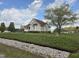 Charming single-Gathering home with a well-maintained yard and a classic architectural design at 46 Grain Ln, Henderson, NC 27537