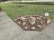 The charming front yard is landscaped with ornamental rocks and is meticulously kept at 46 Grain Ln, Henderson, NC 27537