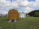 Two sheds in the backyard offer plenty of storage space at 46 Grain Ln, Henderson, NC 27537