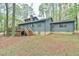 A great house featuring a spacious deck with stairs to the backyard at 505 Marion Way, Chapel Hill, NC 27516