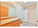 Neutral bathroom with white fixtures, vanity and shower-tub at 505 Marion Way, Chapel Hill, NC 27516
