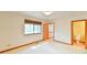 This bedroom features neutral carpet, a window with shades, and an ensuite bathroom at 505 Marion Way, Chapel Hill, NC 27516