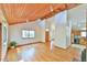Open-concept living space with wood ceilings and beautiful hardwood floors at 505 Marion Way, Chapel Hill, NC 27516