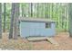 Outbuilding with ramp for easy access and a single window for light at 505 Marion Way, Chapel Hill, NC 27516