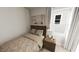 Cozy bedroom features a comfortable bed, a nightstand, and a window for natural light at 520 Folk Song Way, Wendell, NC 27591