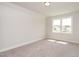 Spacious bedroom with carpet, window, and natural light at 520 Folk Song Way, Wendell, NC 27591