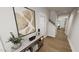 Inviting hallway featuring stylish decor and an open view of the staircase at 520 Folk Song Way, Wendell, NC 27591