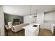 Open-concept living space with a modern kitchen flowing into a comfortable living area at 520 Folk Song Way, Wendell, NC 27591