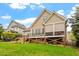Spacious backyard featuring a large deck, creating an ideal setting for outdoor gatherings and relaxation at 528 Clifton Blue St, Wake Forest, NC 27587