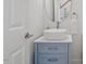 Stylish powder room with a modern vanity, vessel sink, and sleek fixtures at 528 Clifton Blue St, Wake Forest, NC 27587