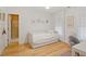 Spacious bedroom boasts gleaming hardwood floors, soft natural light, and a versatile desk area at 528 Clifton Blue St, Wake Forest, NC 27587