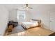 Bedroom featuring hardwood floors, neutral color palette, and bright natural light at 528 Clifton Blue St, Wake Forest, NC 27587