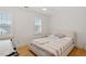 Bright bedroom featuring hardwood floors, a neutral color scheme, and bright natural light at 528 Clifton Blue St, Wake Forest, NC 27587