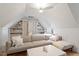 Cozy bonus room offers sloped ceilings, built in shelving, and comfortable seating at 528 Clifton Blue St, Wake Forest, NC 27587