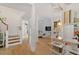Bright, open-concept living space featuring hardwood floors and lots of natural light at 528 Clifton Blue St, Wake Forest, NC 27587