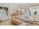 Spacious living area with comfortable seating, hardwood floors, and an open layout into the kitchen at 528 Clifton Blue St, Wake Forest, NC 27587