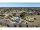 Community clubhouse featuring a pool, tennis courts, and meticulously maintained grounds at 5768 Cavanaugh Dr, Raleigh, NC 27614