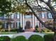 Elegant brick home with classic architectural details and manicured landscaping at 5768 Cavanaugh Dr, Raleigh, NC 27614