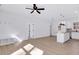 Spacious living area with island seating, and convenient entry to bedroom at 604 E Pope St, Dunn, NC 28334