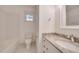 Modern bathroom with a vanity, tile floor, and tub/shower combo at 608 Hemlock Ave, Durham, NC 27707