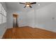 Inviting living room features wood floors and neutral paint, creating a bright space at 609 W Main St, Benson, NC 27504