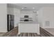 Spacious kitchen with stainless steel appliances, granite countertops, and lots of storage at 7385 Pilatus Ave, Spring Hope, NC 27882
