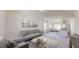 Open concept living room with dining area and kitchen featuring stainless steel appliances at 7385 Pilatus Ave, Spring Hope, NC 27882