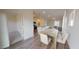 Open concept living space with dining area and modern kitchen with stainless steel appliances at 7385 Pilatus Ave, Spring Hope, NC 27882