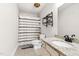 The bathroom features a granite countertop, a shower with a curtain and tile floors at 93 Clifton Pond Rd, Louisburg, NC 27549