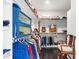 Bright walk-in closet featuring custom storage, shelving, and natural light at 93 Clifton Pond Rd, Louisburg, NC 27549