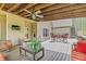 Comfortable outdoor deck with ceiling fan and TV, perfect for entertaining at 93 Clifton Pond Rd, Louisburg, NC 27549