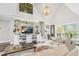Bright and inviting living room with built-in shelving, high ceilings, and natural light, perfect for relaxation and entertainment at 93 Clifton Pond Rd, Louisburg, NC 27549