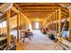 Spacious unfinished attic with exposed wooden beams and potential for customization at 95 Watermeadow Dr, Clayton, NC 27520