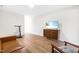 Finished basement with a sofa, a dresser with a TV, and some other furnishings at 95 Watermeadow Dr, Clayton, NC 27520