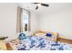 bedroom features carpet, lots of light, with a bed, and a small chair at 95 Watermeadow Dr, Clayton, NC 27520