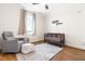 Cozy Bedroom with a gray rocking chair, dark wood crib, and soft area rug for a peaceful setting at 95 Watermeadow Dr, Clayton, NC 27520