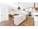 Modern kitchen with large island, stainless steel appliances, and an open layout at 95 Watermeadow Dr, Clayton, NC 27520