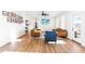 Comfortable living room features hardwood floors, modern lighting and a seamless flow to the outdoor patio at 95 Watermeadow Dr, Clayton, NC 27520
