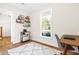 Office space with lots of natural light, neutral walls, and wood-look floors at 95 Watermeadow Dr, Clayton, NC 27520