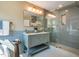 Stylish bathroom featuring a walk-in glass shower, modern vanity, and fixtures, combining luxury with functionality at 103 Windhover Dr, Chapel Hill, NC 27514