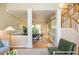 Dining room with decorative columns, hardwood floors and a large window at 103 Windhover Dr, Chapel Hill, NC 27514