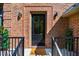Stylish front door with sidelights and a welcoming 'hello' doormat at 103 Windhover Dr, Chapel Hill, NC 27514
