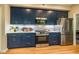 Kitchen boasts new appliances, quartz counters, and subway tile backsplash at 103 Windhover Dr, Chapel Hill, NC 27514