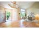 Bright living room featuring a soaring ceiling and an open floor plan at 103 Windhover Dr, Chapel Hill, NC 27514