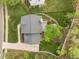 A two-story home featuring a lush, green lawn with an elongated driveway and a charming deck at 104 Dallavia Ct, Morrisville, NC 27560