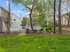 Well-maintained backyard featuring a deck and gazebo, perfect for relaxing outdoors at 104 Dallavia Ct, Morrisville, NC 27560