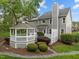 Well-kept backyard with a gazebo, deck, landscaping, and rock drainage feature at 104 Dallavia Ct, Morrisville, NC 27560