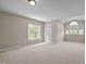 Spacious bedroom featuring large windows allowing ample natural light at 104 Dallavia Ct, Morrisville, NC 27560