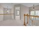 Hallway with natural light, leading to other rooms in the home at 104 Dallavia Ct, Morrisville, NC 27560