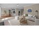 Bright living room with neutral tones, a cozy couch and a modern rug at 104 Dallavia Ct, Morrisville, NC 27560